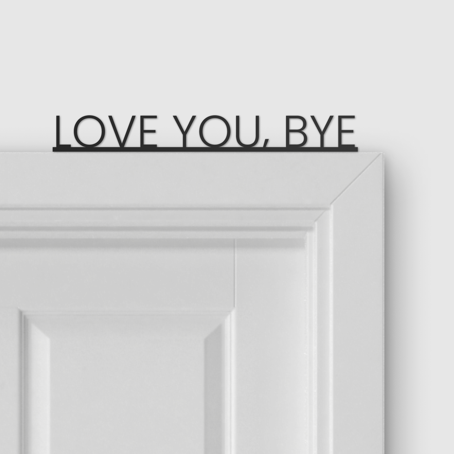 Love You, Bye Door Topper displayed above a door