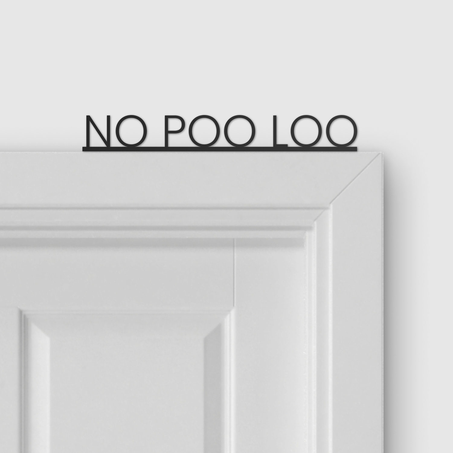 No Poo in the Loo Door Topper displayed above a door